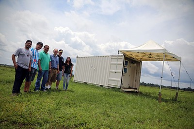 In 2013, scientists were beginning to site ARM instrumentation in shed-like pods. Third from right is Scot Martin, GoAmazon2014/15 principal investigator. Image courtesy of Harvard University.