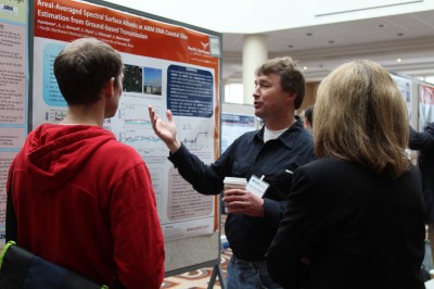 Evgueni Kassianov presents his poster during an ARM/ASR Joint Meeting.