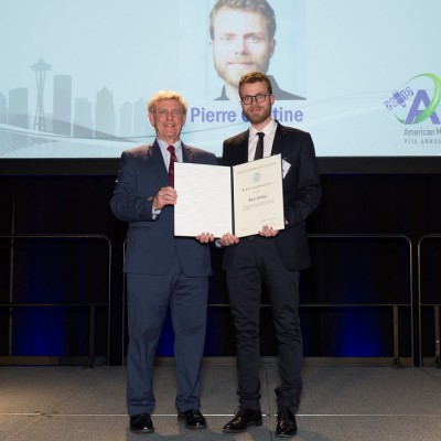 ASR scientist Pierre Gentine, right, poses with Fred Carr, then-president of the American Meteorological Society, after winning the Clarence Leroy Meisinger Award at the 97th annual AMS meeting in January 2017 in Seattle, Washington. Photo courtesy of the AMS.