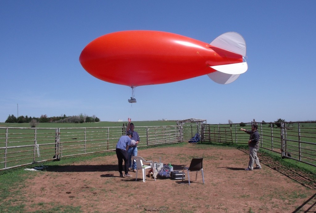 Through a project funded by ASR since 2013, the New Particle Formation Study used a tethered balloon mounted with condensation particle counters and a portable weather station to collect aerosol data over the ARM Climate Research Facility observatory in Oklahoma.