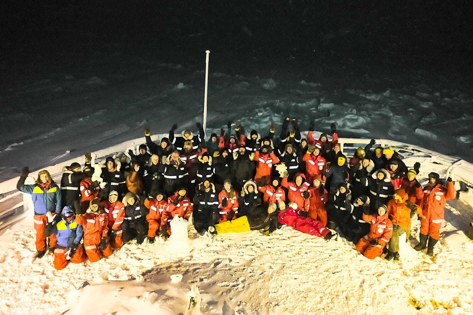 MOSAiC team waves on Kapitan Dranitsyn icebreaker