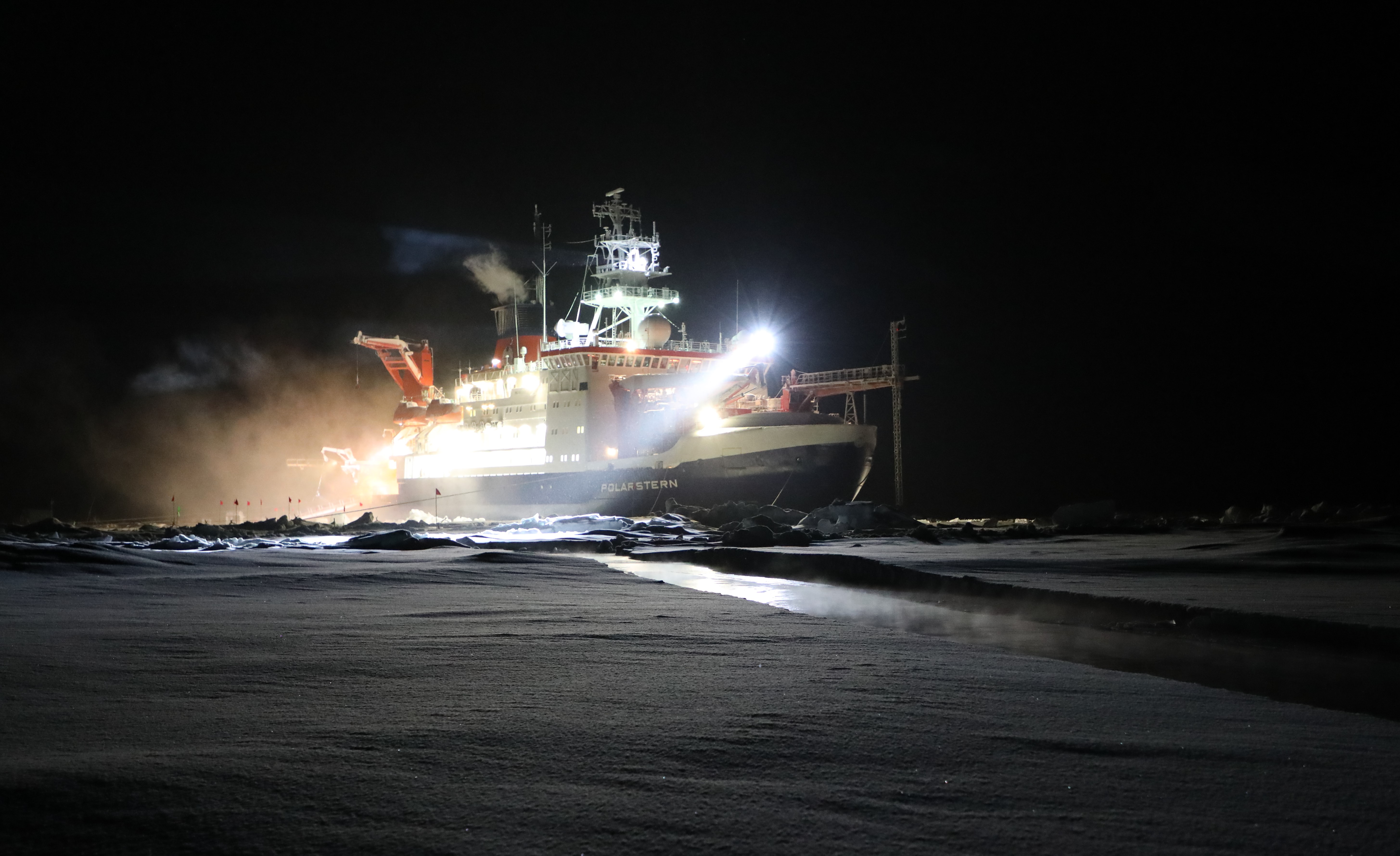 During the 2019–2020 Multidisciplinary Drifting Observatory for the Study of Arctic Climate (MOSAiC) expedition, the research icebreaker R/V Polarstern is ablaze with lights during polar night, which lasted four months. 