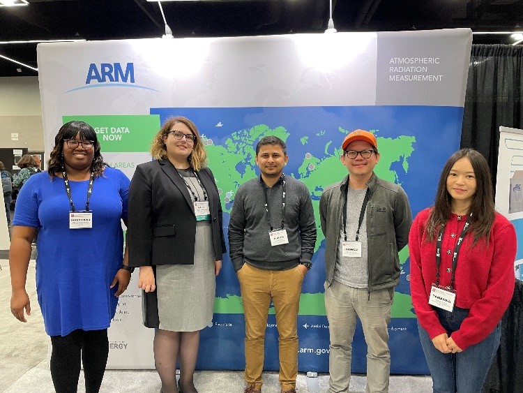 Atmospheric scientists from Brookhaven National Laboratory pose for a group photo at the ARM booth during the 41st annual conference of the American Association for Aerosol Research (AAAR) in Portland, Oregon. From left to right are Ogochukwu “Ogo” Enekwizu, Maria Zawadowicz, Ashish Singh, Chongai Kuang, and Tamanna Subba.