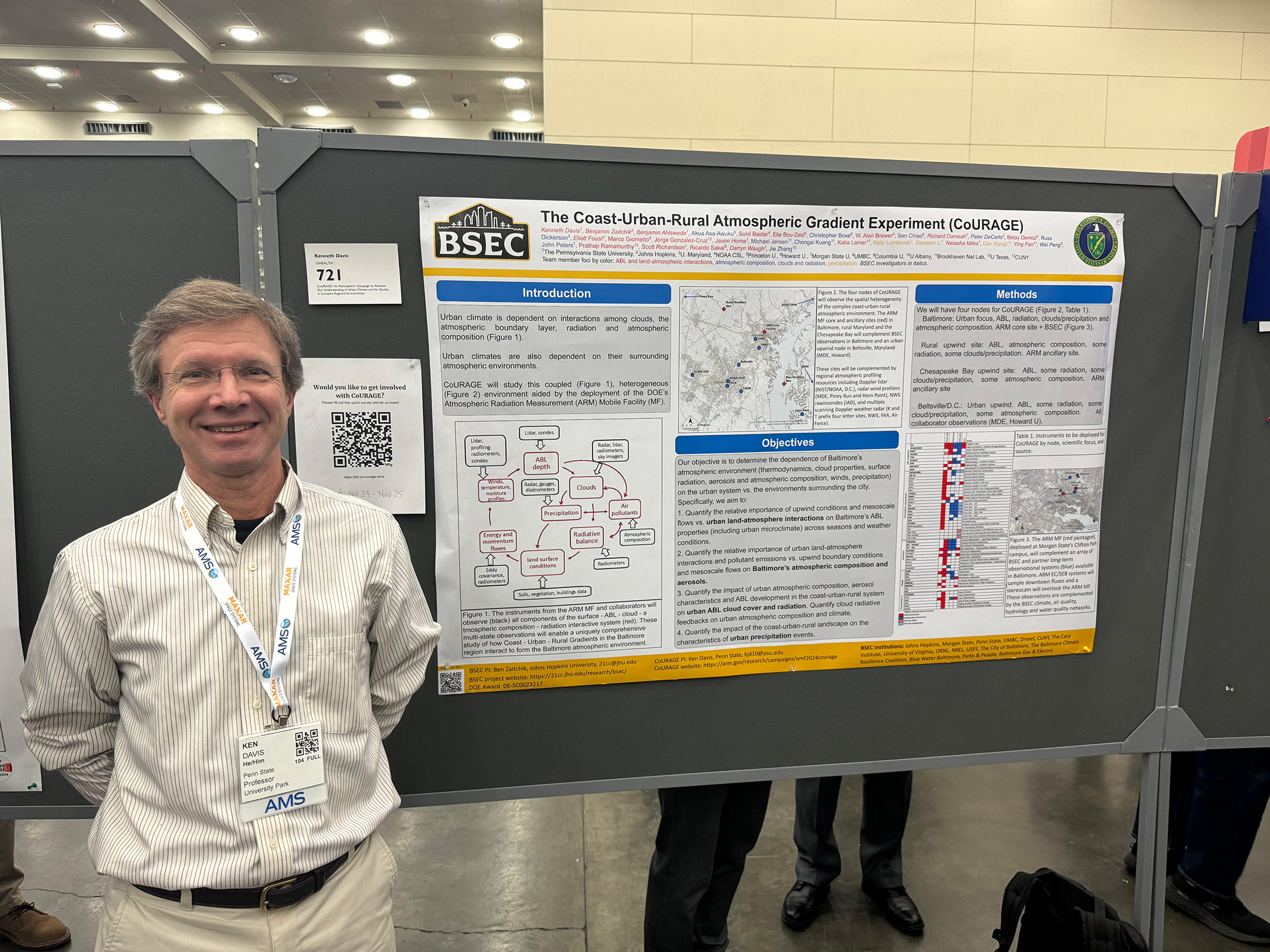 Kenneth Davis of Pennsylvania State University stands alongside his Coast-Urban-Rural Atmospheric Gradient Experiment (CoURAGE) overview poster.