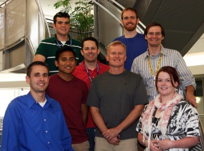 Theisen, bottom row left, poses in 2010 with colleagues from ARM’s data quality office in Oklahoma.