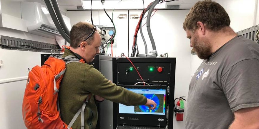 CACTI Principal Investigator Adam Varble, left, and computational scientist Joseph Hardin, both from Pacific Northwest National Laboratory at Washington state, discuss a radar image at the ARM Mobile Facility site. During the 2020 American Geophysical Union and 2021 American Meteorological Society annual meetings, Hardin presented a set of algorithms being used to process raw radar data from CACTI.