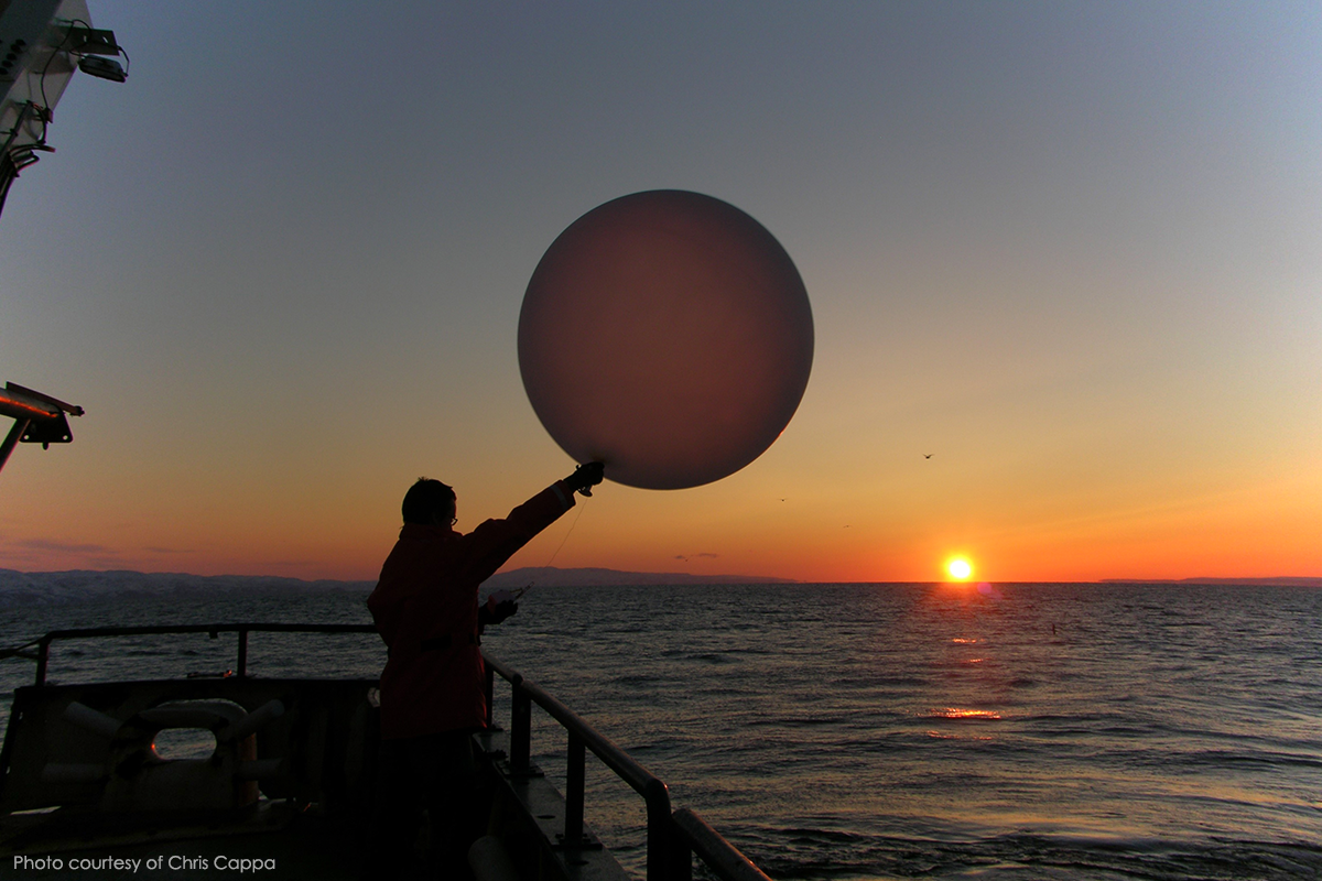 In the summer of 2010, Cappa launches a radiosonde while aboard the R/V Atlantis research vessel off California's coast. 