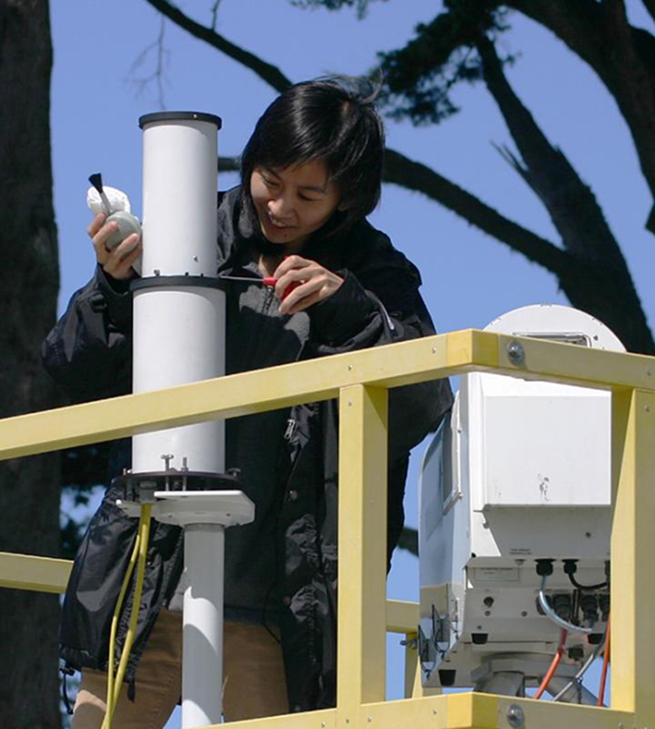 Christine Chiu works on a 2-channel radiometer during the 2005 Marine Stratus Radiation Aerosol and Drizzle (MASRAD) field campaign in Northern California.