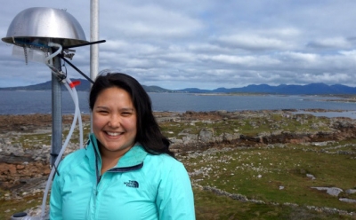 McCluskey poses for a photo at Mace Head Research Station in western Ireland. She participated in a project in which data collected resulted in a parameterization—simplified representation—of marine ice-nucleating particles. 