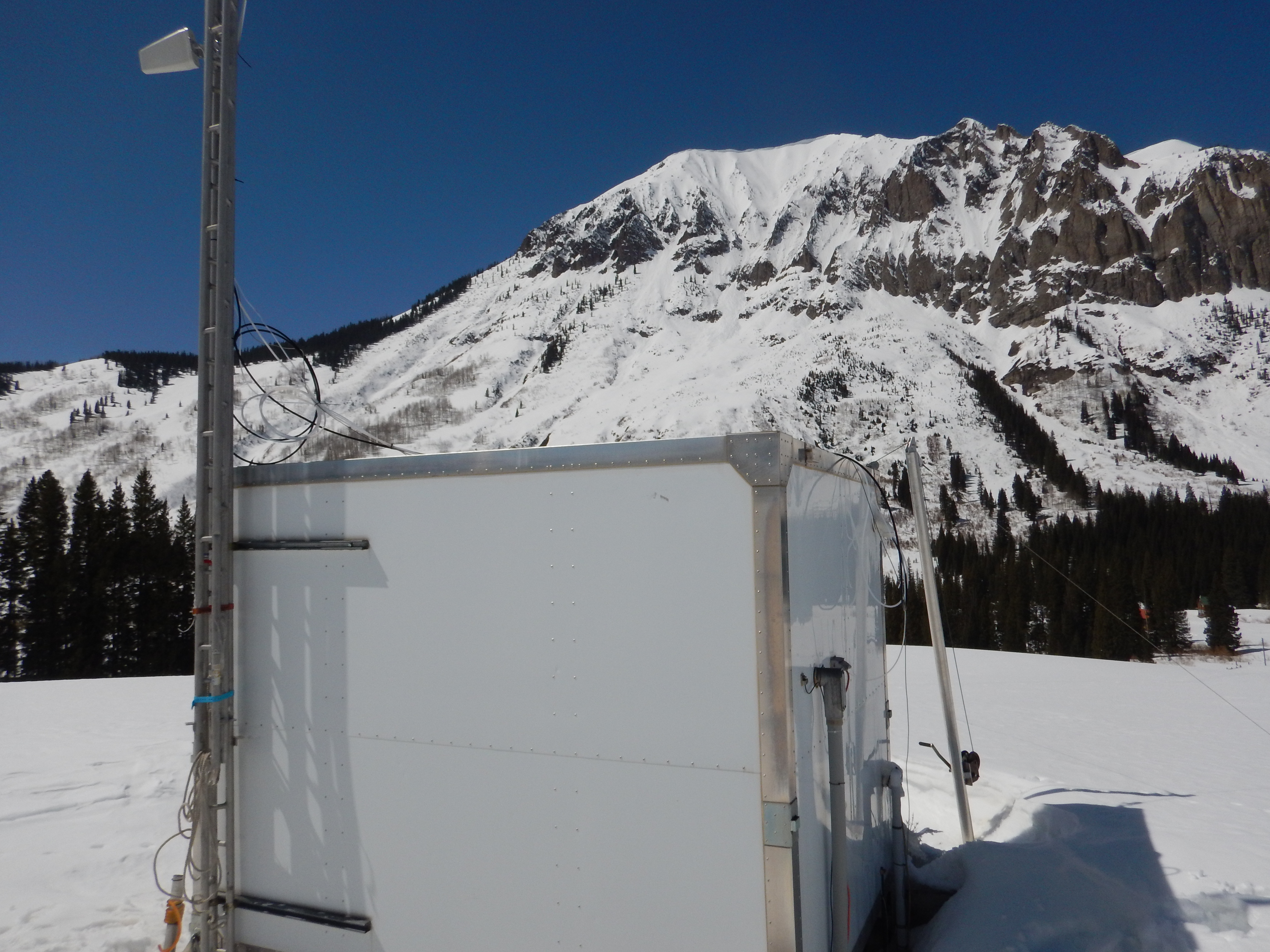 SAIL instruments will be located near a Clean Air Status and Trends Network (CASTNET) site in Gothic, Colorado. It contains instrumentation to measure aerosol composition and has been doing so for decades. Gothic Mountain in the background. 