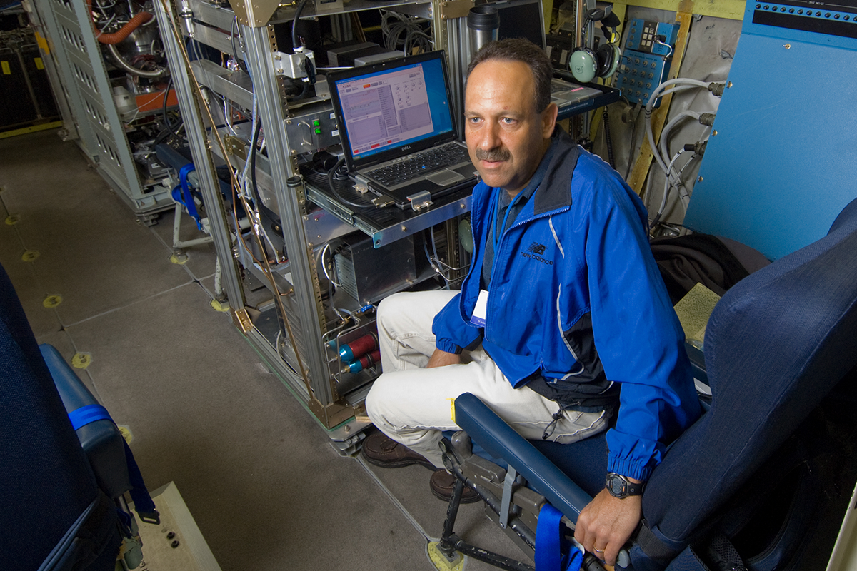 In 2007, Colorado State University atmospheric scientist Paul DeMott pauses aboard a C-130 research aircraft operated by the National Center for Atmospheric Research. Photo is courtesy of Paul DeMott. 