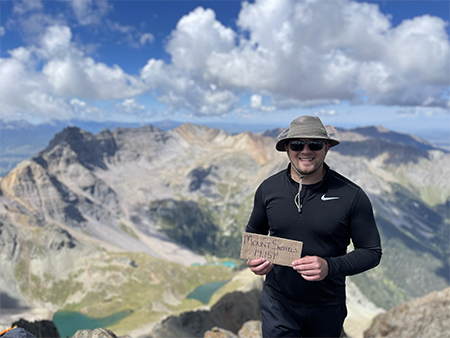 In the summer of 2022, atmospheric research scientist Andrew Dzambo took a hardcore hike to the summit of Mt. Sneffels (elevation: 14,157 feet) in the Rocky Mountains of Colorado, near Telluride. 
