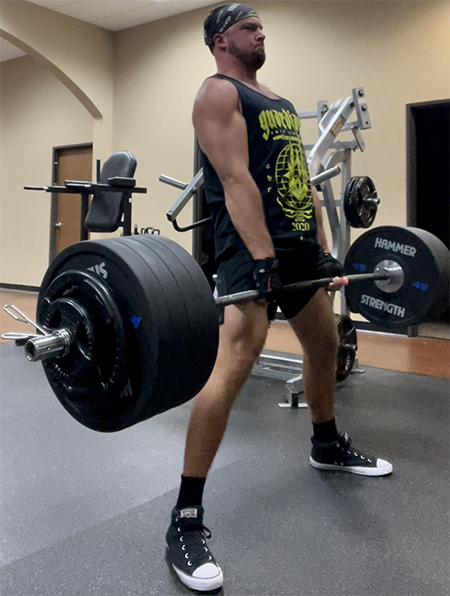 At the gym three or four days a week, in 2022 Dzambo runs through a powerlifting routine of deadlifts (as above), squats, and bench presses, and a variety of specialized workouts. 