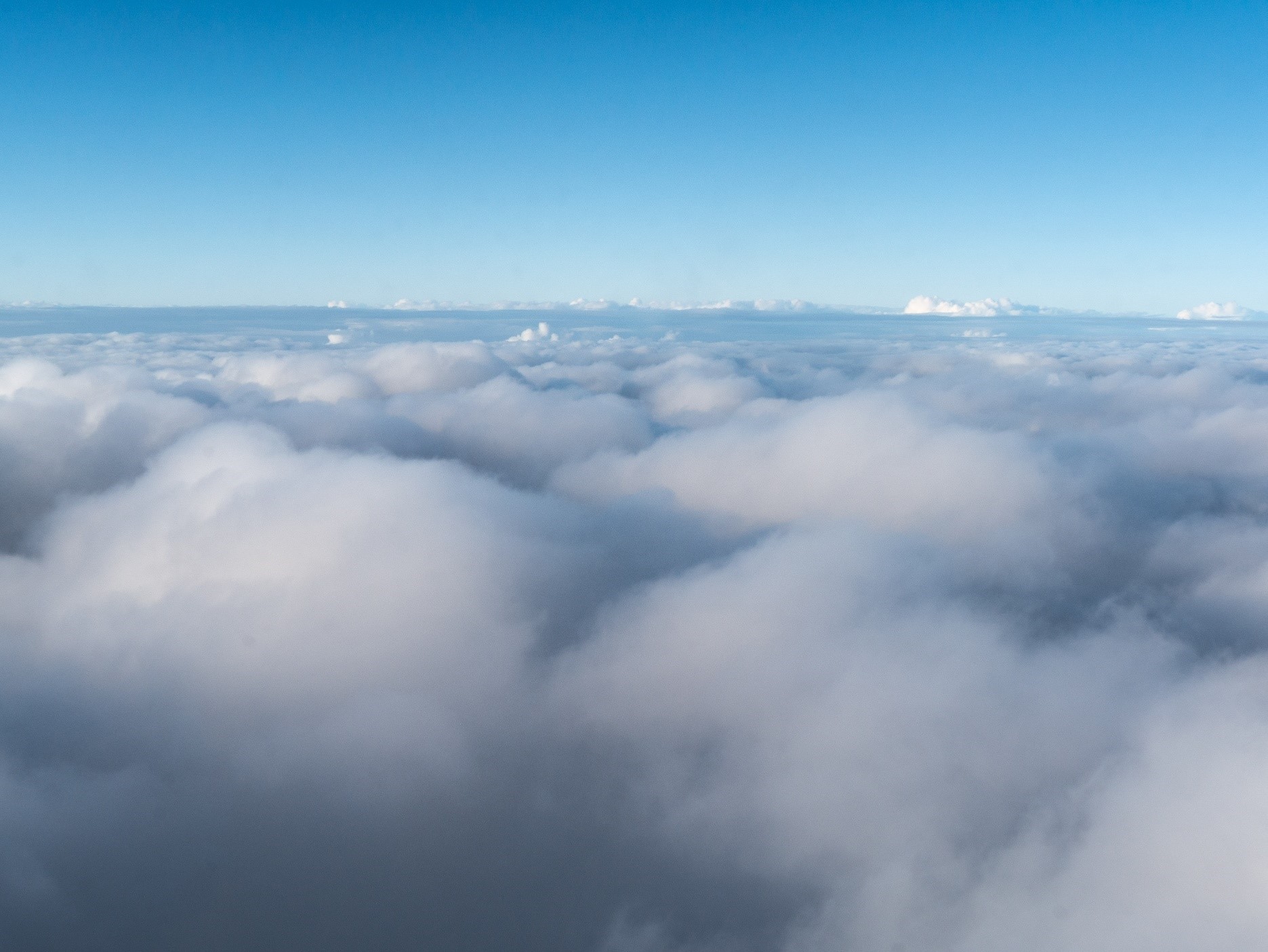 Aboard a NOAA research aircraft, Feingold snapped this high-altitude vista during the Atlantic Tradewind Ocean-Atmosphere Mesoscale Interaction Campaign (ATOMIC) over the Tropical North Atlantic Ocean near Barbados. “We were skimming the cloud tops,” he says. 