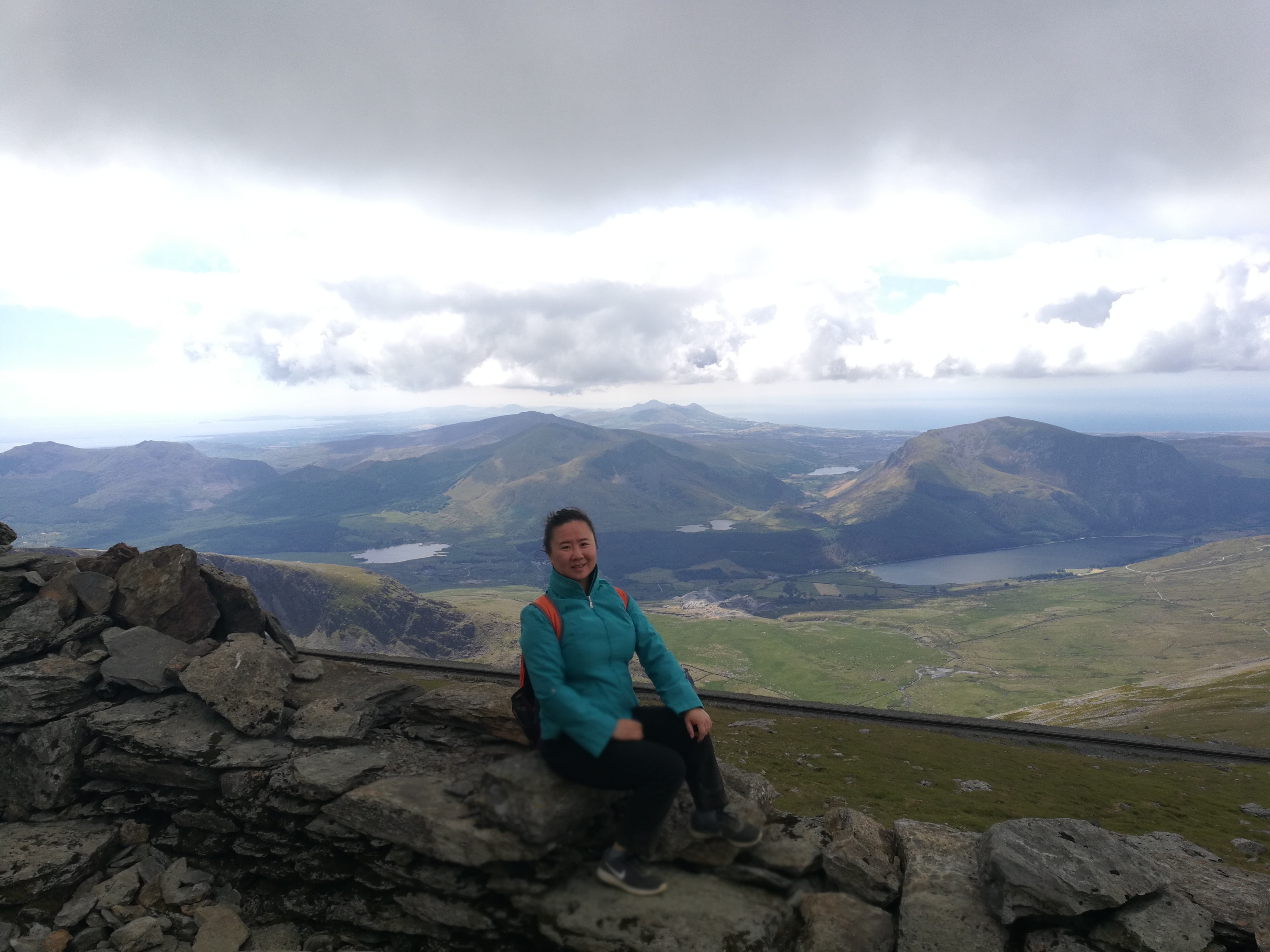 During a personal trip to Wales in July 2018, Yan Feng poses at the summit of Snowdon, Great Britain’s highest mountain outside the Scottish Highlands. 