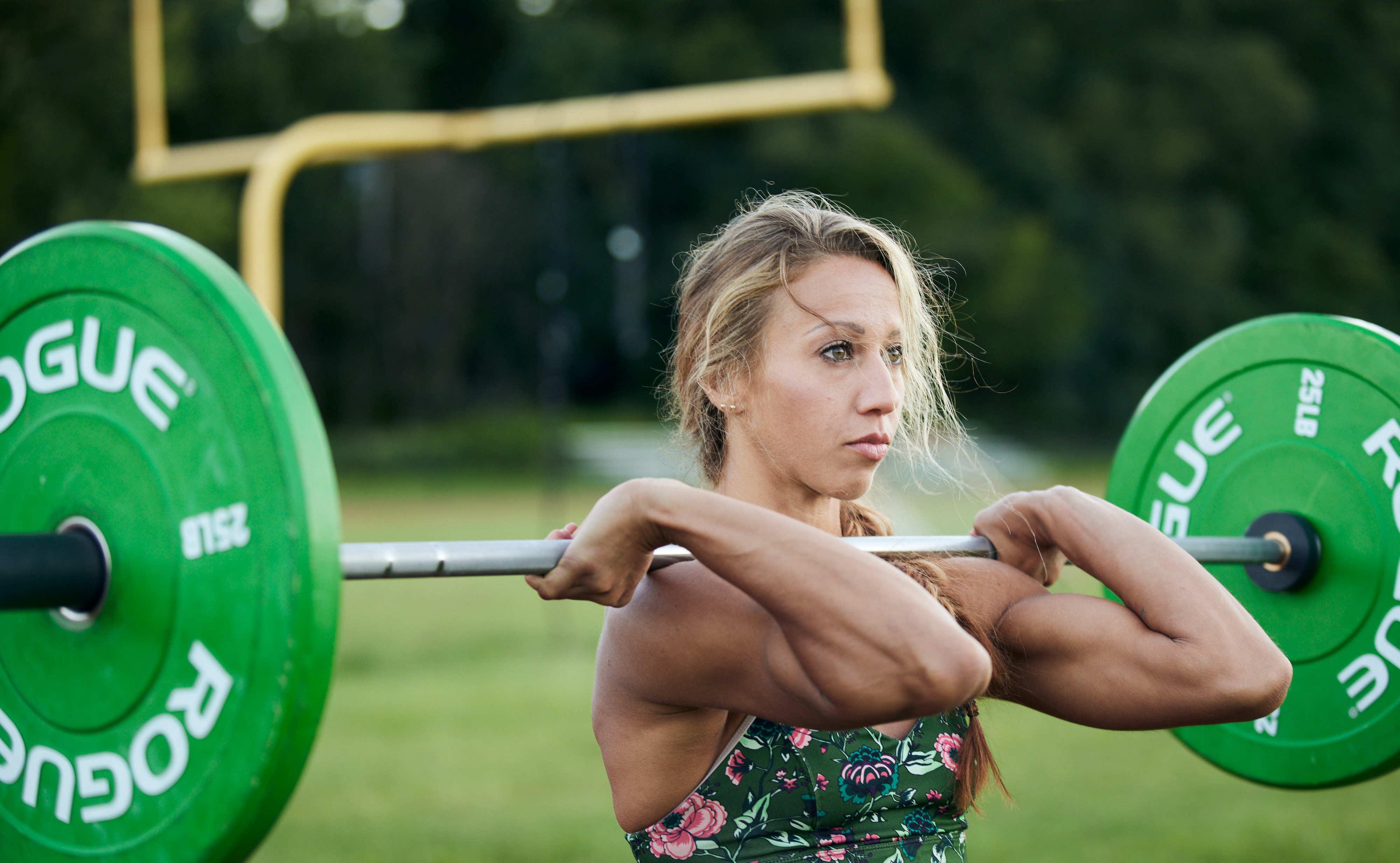 Ice-crystal growth theorist Kara Sulia, seen here hefting iron in preparation for a squat, is a dedicated CrossFit practitioner and works out every day.