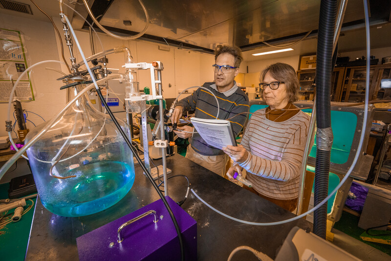 Daniel Knopf and Josephine Aller work in Stony Brook’s School of Marine and Atmospheric Sciences Aerosol Research Laboratory, where they simulate aerosols from ocean waters that can initiate ice crystals affecting cloud formation. Photo is by John Griffin, Stony Brook University.