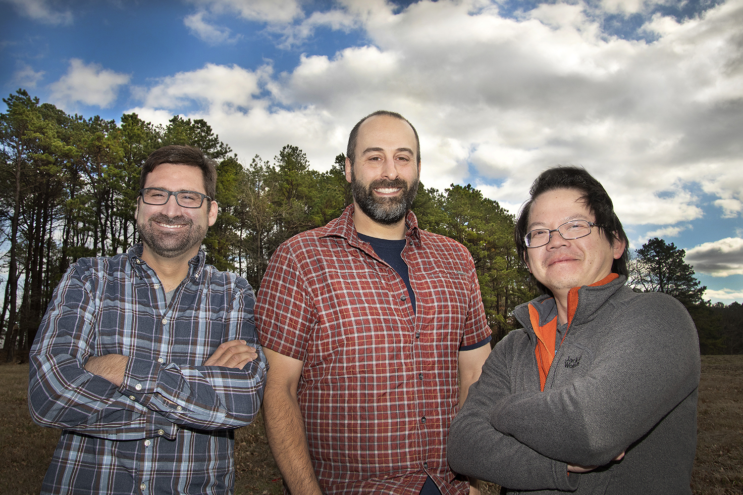 Chongai Kuang, pictured at the far right in pre-pandemic March 2020, worked with two Brookhaven colleagues to select a new site in the southeastern United States for the third ARM Mobile Facility (AMF-3). At left is associate ecologist Shawn Serbin. In the middle is meteorologist Scott Giangrande. Photo is courtesy of Brookhaven National Laboratory.