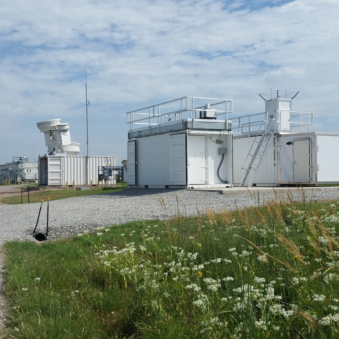 A Doppler radar at ARM’s Southern Great Plains atmospheric observatory is on top of the trailer to the left.