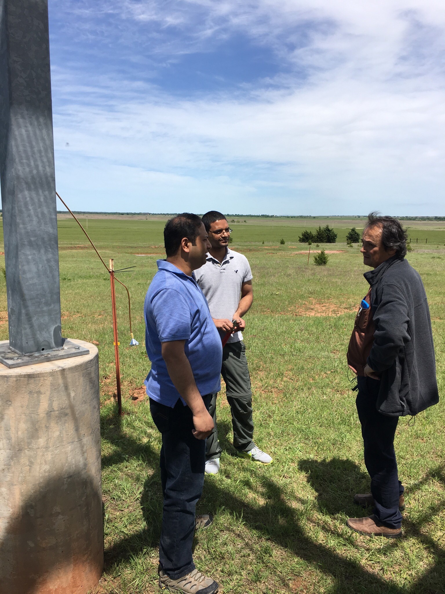 Laskin sometimes ventures out into the field and works closely with observational scientists. Here he is in 2016 at the SGP ARM site in Lamont, Oklahoma, with PNNL colleagues Gourihar Kulkarni, left, and Swarup China, middle. Photo is courtesy of Laskin. 