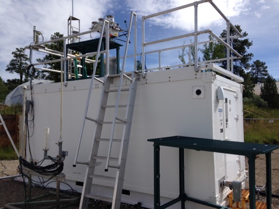 Before the ARM West Antarctic Radiation Experiment (AWARE) got underway, its instruments were field-tested at Los Alamos National Laboratory in New Mexico. Above, a portion of the second ARM mobile facility (AMF2) went through trials. Photo courtesy of Lubin.