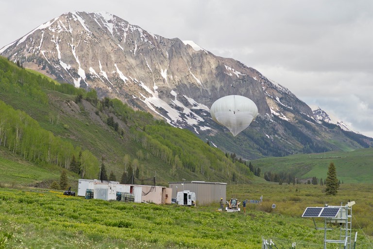 During the Surface Atmosphere Integrated Laboratory field campaign in Colorado, Zawadowicz and her team investigated the local aerobiome with instruments mounted on an ARM tethered balloon system like the one in the June 2023 image above. Photo by Nathan Bilow.