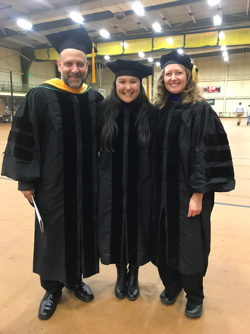 Upon receiving her PhD from Colorado State University in 2017, McCluskey, center, takes a moment with her mentors, senior research scientist Paul DeMott and professor Sonia Kreidenweis.