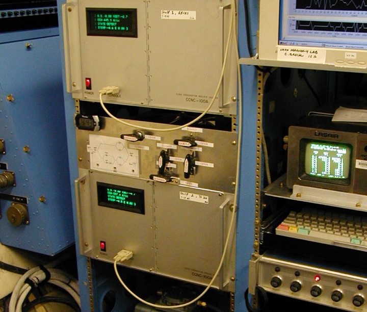 Front view of a rack containing, on the left, Jeff Snider’s University of Wyoming cloud condensation nuclei (CCN) counter, operated by Petters. It was onboard an NSF/NCAR C-130 research aircraft during the 2001 Second Dynamics and Chemistry of Marine Stratocumulus (DYCOMS -II) field study. Data from DYCOMS-II informed Petters’ 2004 PhD dissertation. 