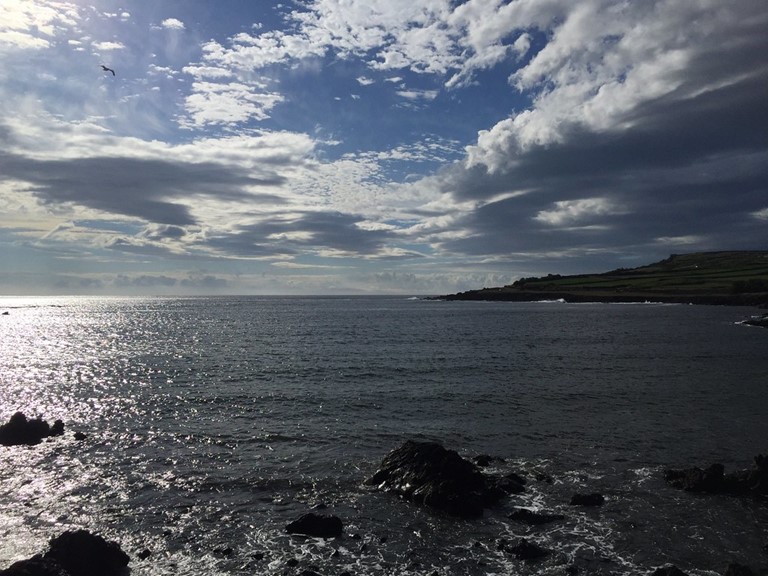 Clouds fill the sky offshore from the Eastern North Atlantic atmospheric observatory in the Azores, source of much of the data for Miller’s 2021–2024 ASR project. 