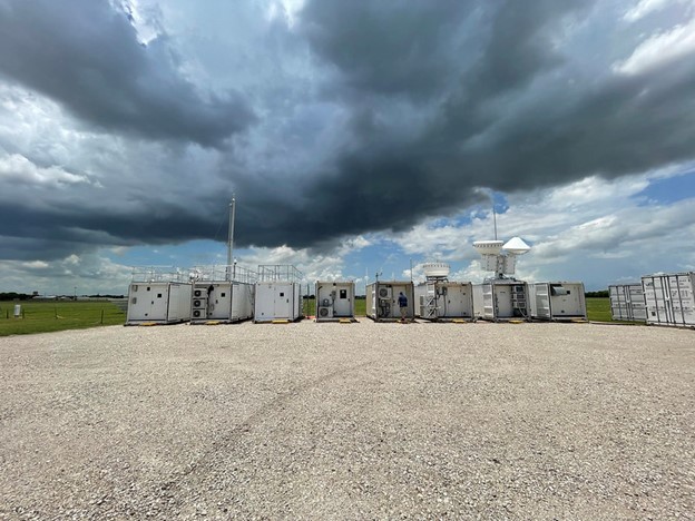 Dark clouds streak above the ARM Mobile Facility operating in La Porte, Texas, as part of the TRacking Aerosol Convection interactions ExpeRiment (TRACER) in June 2022.