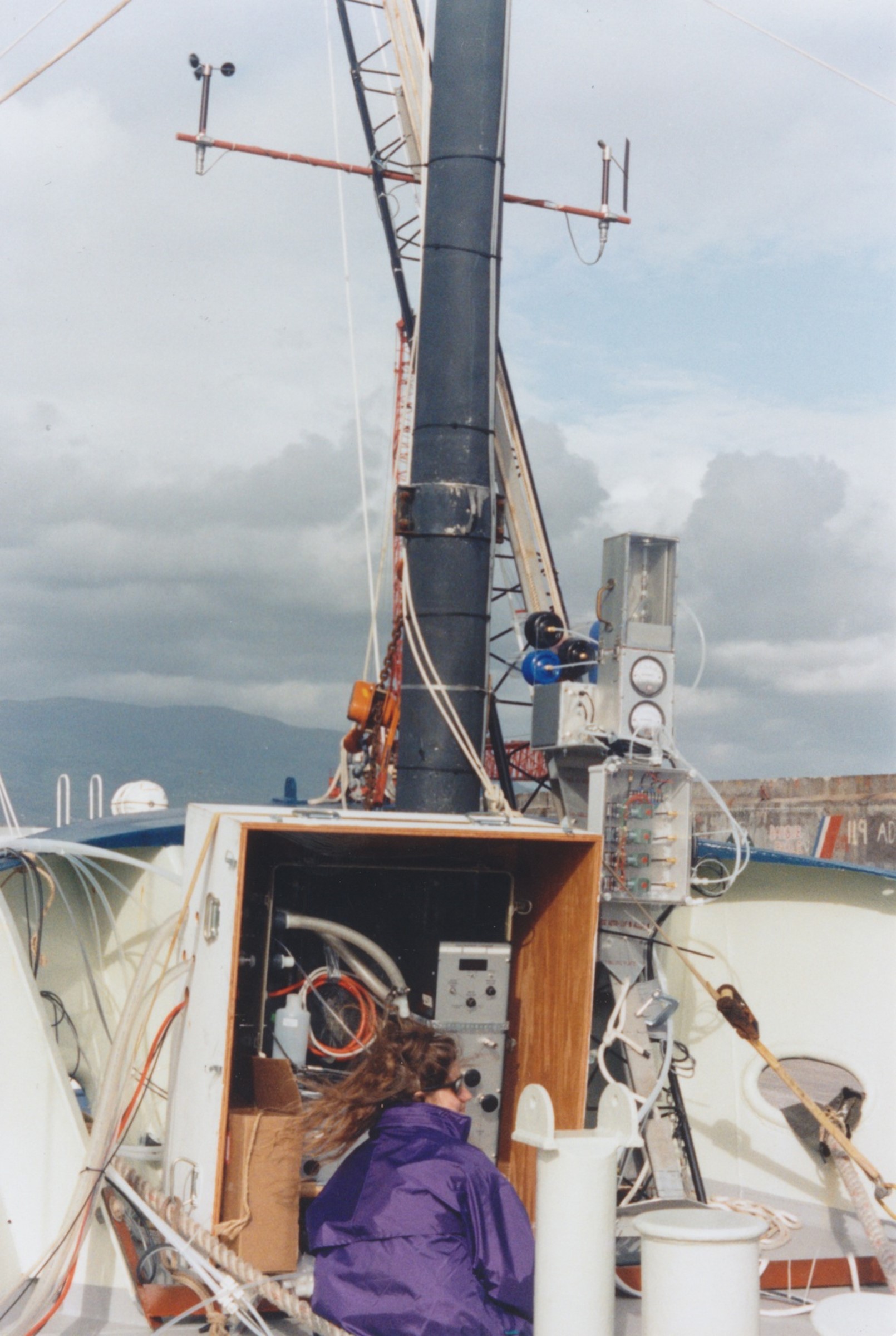 Lynn Russell, a graduate student in this 1992 photo, takes aerosol measurements in the mid-Atlantic during her first field campaign, the Atlantic Stratocumulus Transition Experiment/Marine Aerosol and Gas Exchange (ASTEX/MAGE).