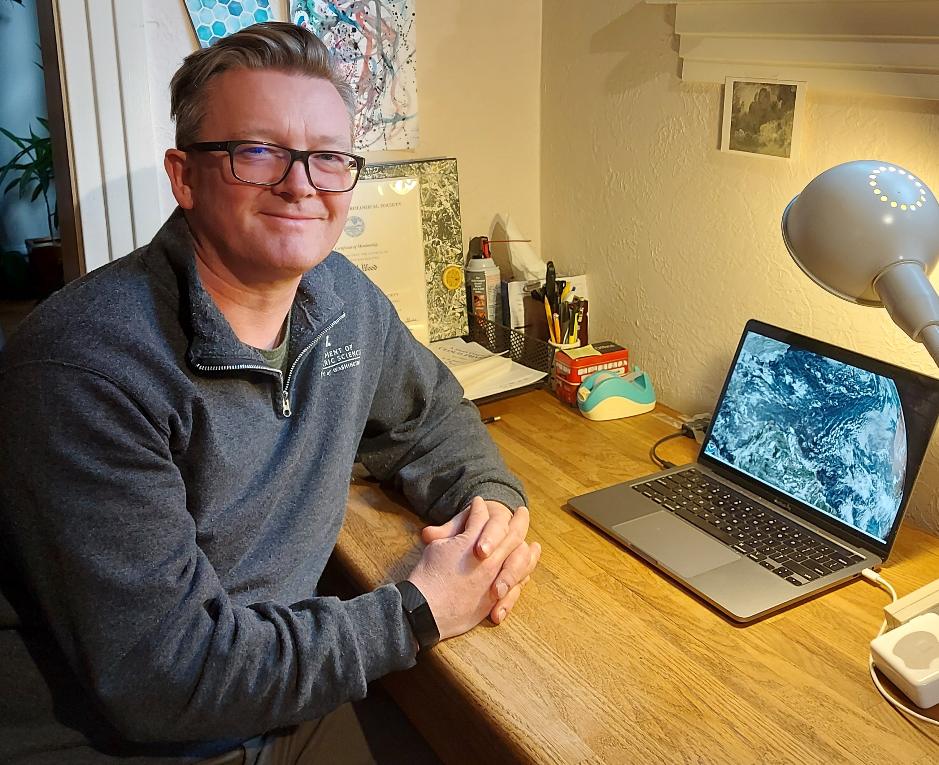 University of Washington cloud physicist Rob Wood pauses during work at home in October 2021.