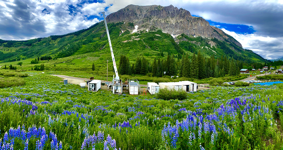 In late June 2021, in Gothic, Colorado, a crane hoists AMF2 containers in place to get ready for the September 1 start of SAIL. 