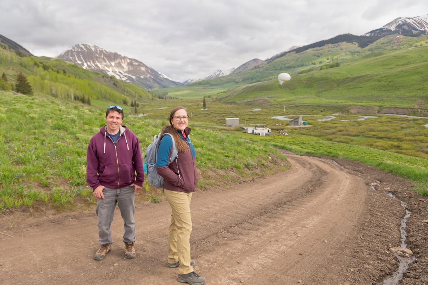 In June 2023, the last month of data collection for ARM’s Surface Atmosphere Integrated Field Laboratory (SAIL) campaign, principal investigator Daniel Feldman (left) and co-investigator Allison Aiken hiked through the East River Watershed study area near Crested Butte, Colorado. SAIL, an investigation of the atmospheric processes that control the hydrology of the Upper Colorado River Basin, ended its observational phase after 21 months. Photo is by Nathan Bilow.