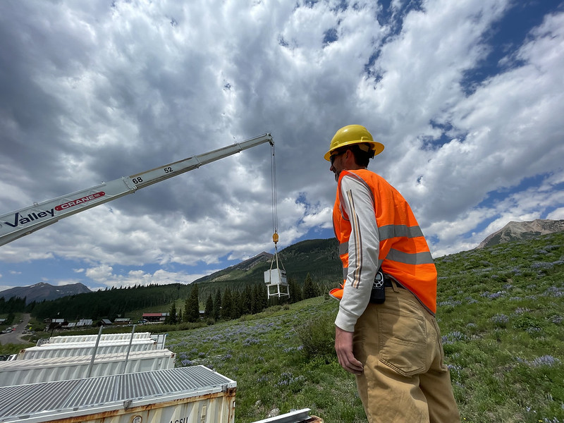 In June 2021 in Gothic, Colorado, John Bilberry supervised the installation of an instrument that is now recording vertical profiles of atmospheric temperature and humidity during the SAIL campaign. Bilberry is the project manager for the ARM SAIL deployment. Photo is by David Chu, Los Alamos National Laboratory.