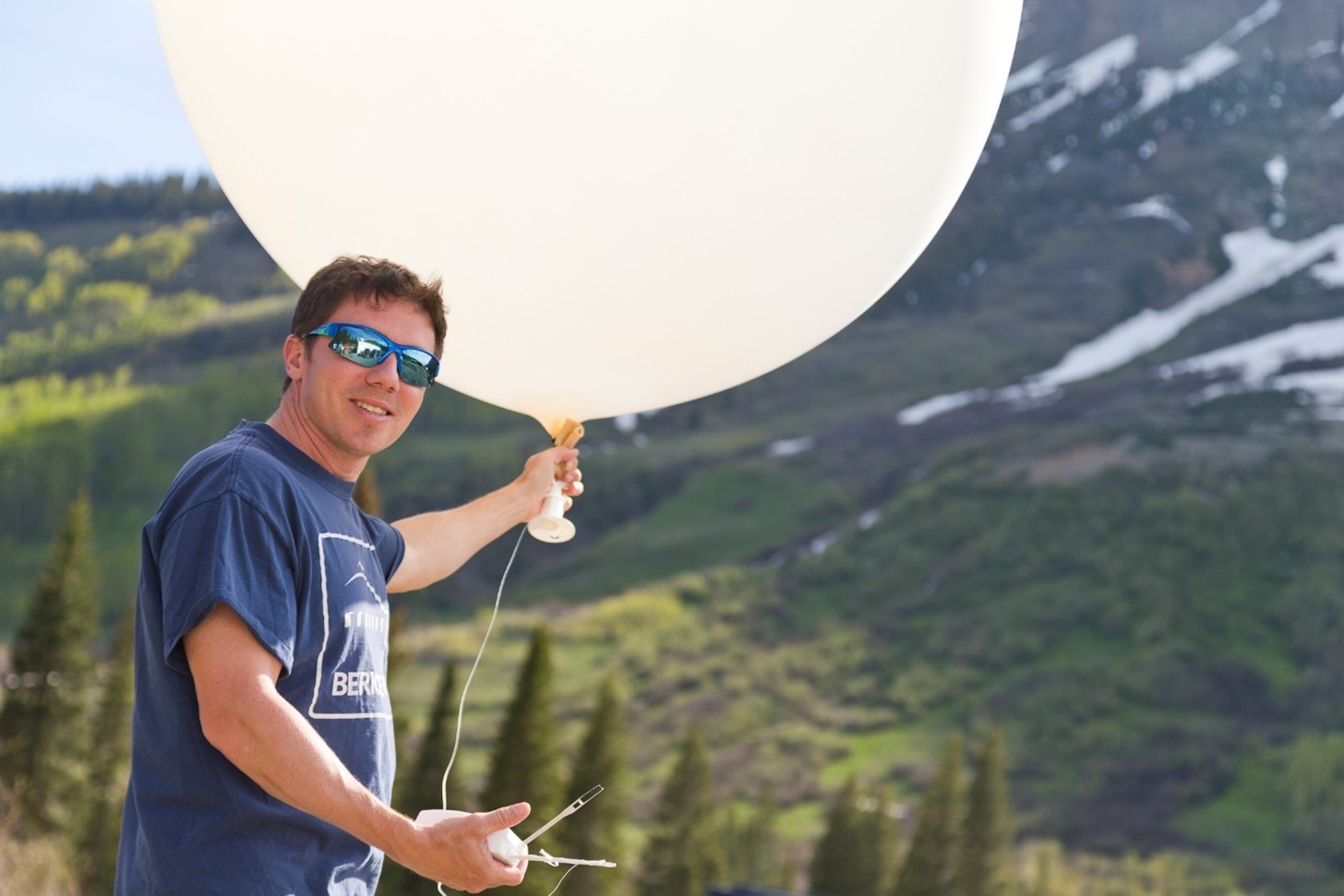 Radiosondes attached to balloons transmit data on the fine structure of atmospheric temperature, humidity, and winds: some of the “puzzle pieces” that Feldman attributes to SAIL during its 21-month observational run. Here, Feldman launches a radiosonde in June 2023. Photo is by Bilow.