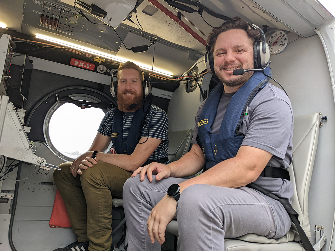 Witte (left), principal investigator for the SCILLA flight deployment, and University of California, Santa Cruz, graduate student Mason Leandro prepare for takeoff in the mission scientist seats of the Twin Otter on June 22. Mission scientists provide guidance to pilots to execute the flight plan based on actual conditions encountered, communicate via satellite link with ground scientists tracking satellite and forecast products, and monitor instruments in flight. Photo is courtesy of Chuang.