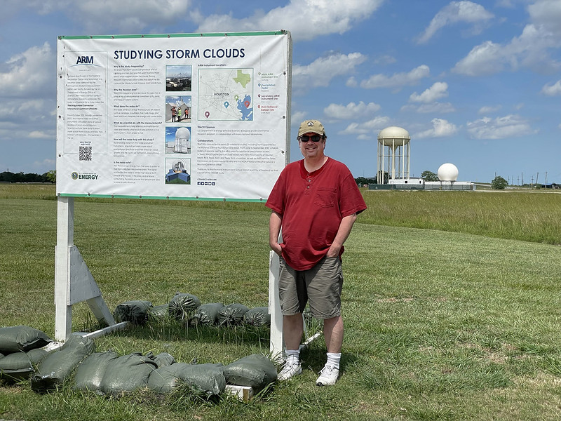 In August 2022, TRACER’s lead scientist, Michael Jensen, visited Pearland, Texas. In the background is the bulb-like second-generation C-Band Scanning ARM Precipitation Radar (CSAPR2), which captured novel images of evolving convective cloud cells.