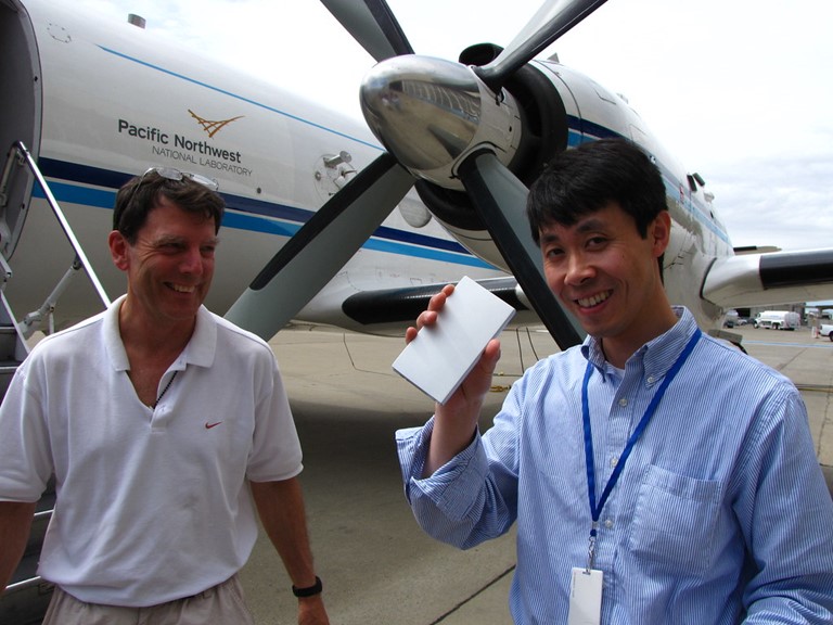 In 2010, Wang (at right) was in the Sacramento, California, area for an ARM campaign called the Carbonaceous Aerosol and Radiative Effects Study (CARES). Aircraft-mounted instruments collected data from a mobile plume of urban pollution. Next to Wang is now-retired ARM engineer John Hubbe.