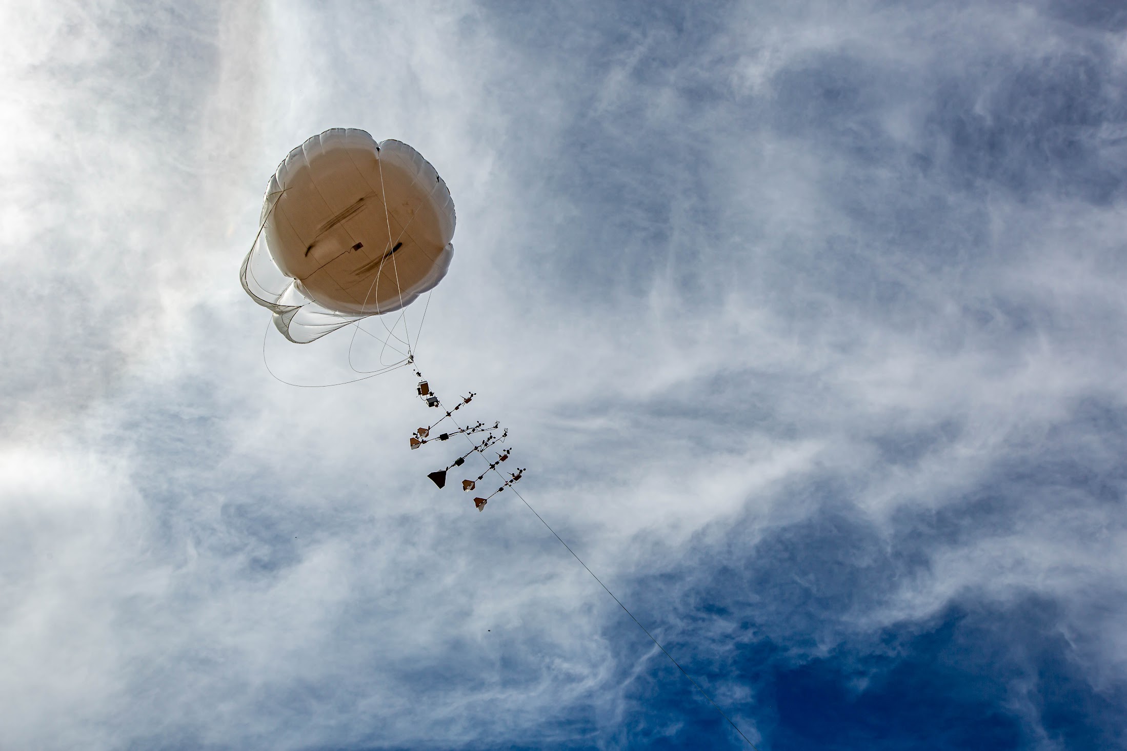 In June 2024, a tethered balloon carries instruments aloft for a small campaign above ARM’s Southern Great Plains (SGP) atmospheric observatory in Oklahoma. 