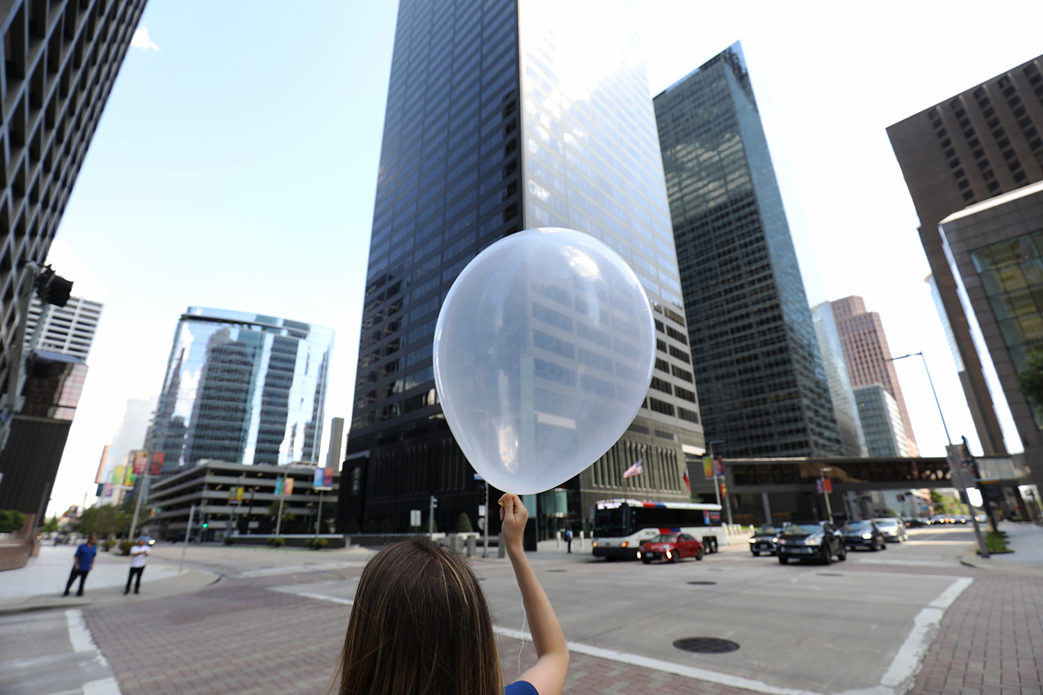 Katia Lamer prepares to release a mini radiosonde balloon in Houston, Texas, where the team is mapping the urban heat island using a new observational technique. Photo is courtesy of ARM. 