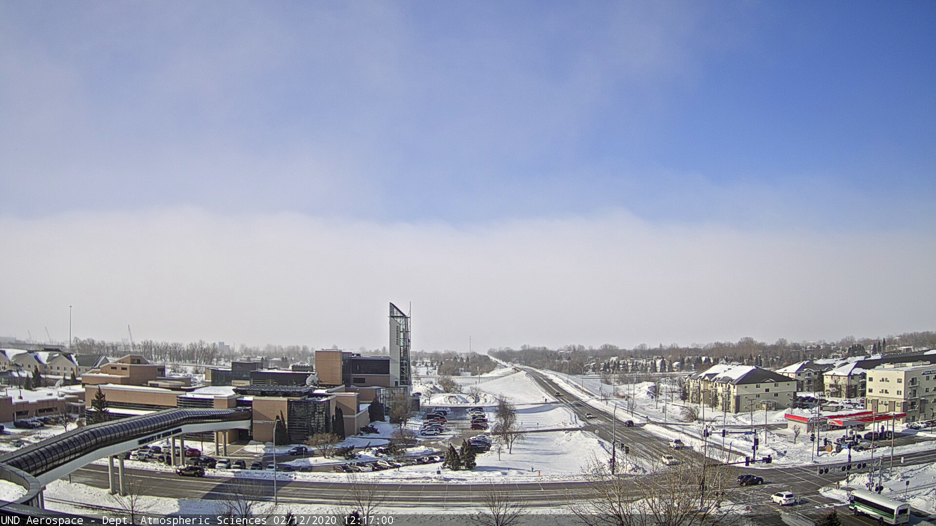 Convective rolls of blowing snow move past the campus of the University of North Dakota in Grand Folks in February 2020. 